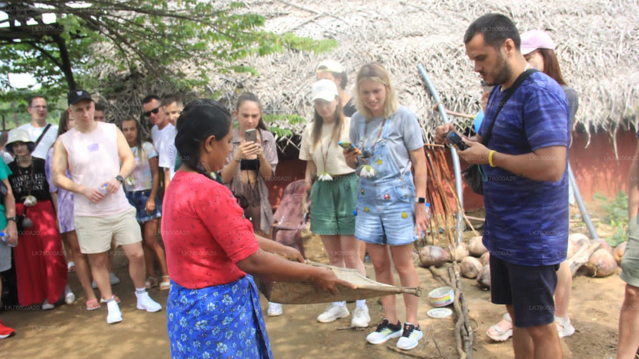 Woman demonstrating a traditional craft to tourists in a cultural setting